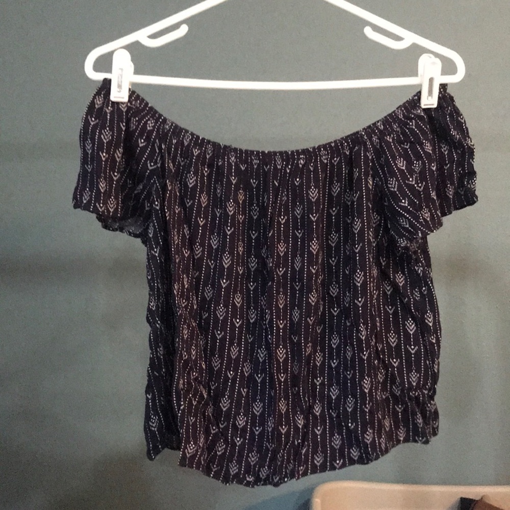Off the shoulder shirt.